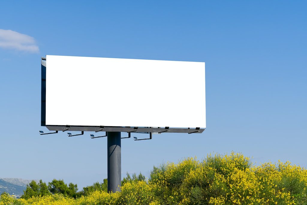Blank billboard against sky. Billboard - Large Blank Billboard with empty screen and beautiful sky
