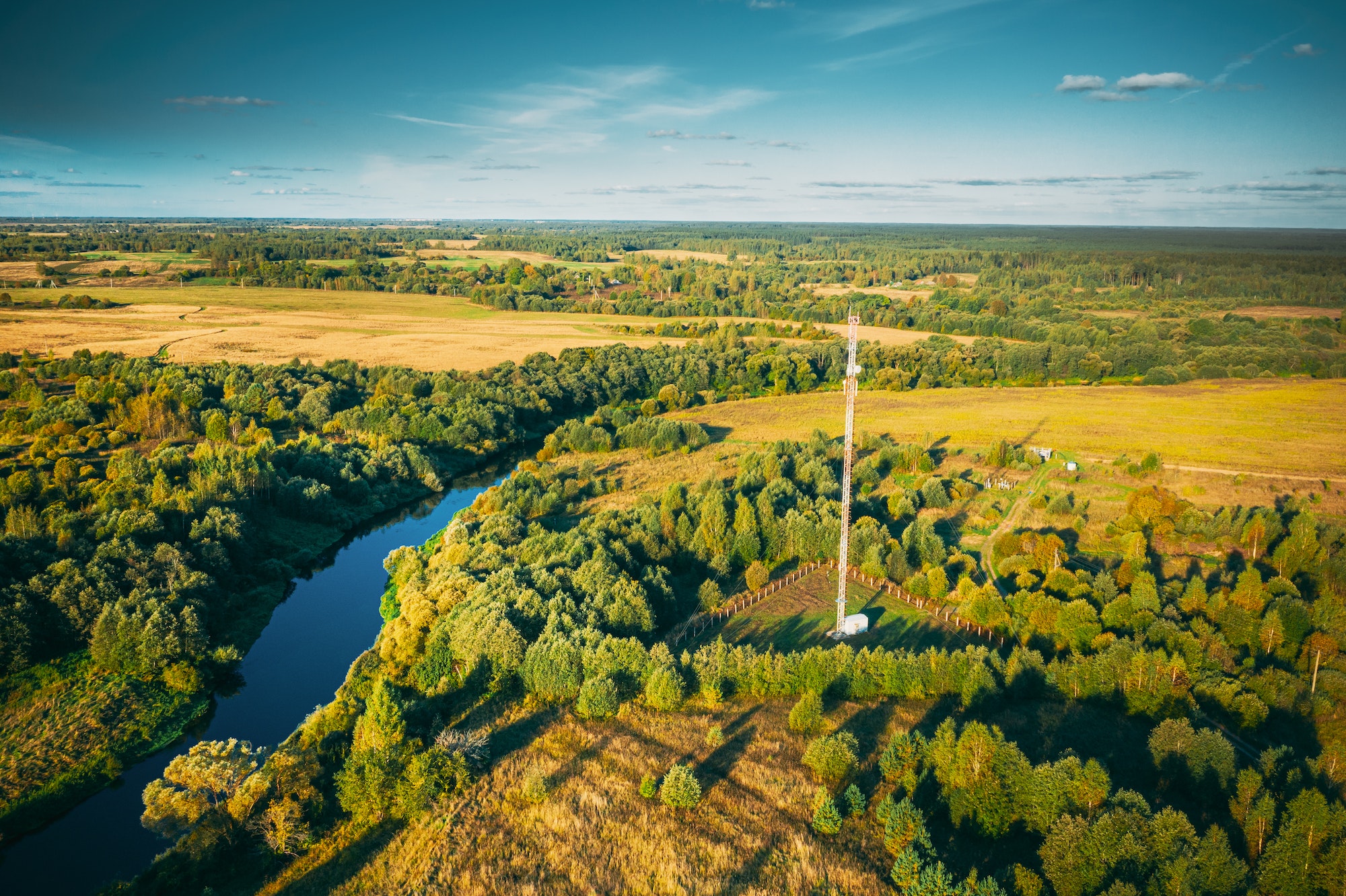 Telecommunications Cell Phone Tower With Antenna In Countryside. Belarus. Aerial View